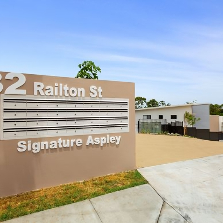 Modern building with address sign