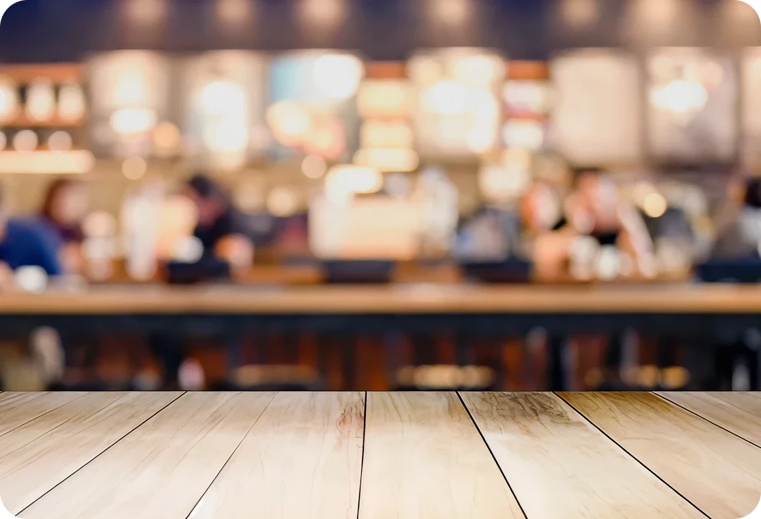 Blurred coffee shop interior with table